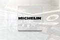 Michelin on glossy office wall realistic texture